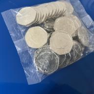 2023 Gibraltar Christmas 50p Two children building snow - sealed bag of 50 coins