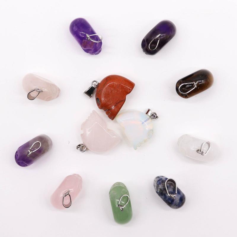 Assortment of Crystal Skull Pendants (12) (incl p&p)